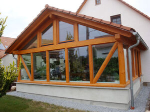 Wintergarten rustikal mit Kiefer Blockbohlen
